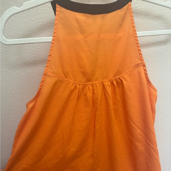 Orange with black trim sleeveless blouse - Picture 2 of 3